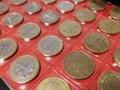 Various coins in the numismatics album