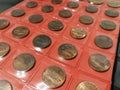 Various coins in the numismatics album