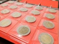 Various coins in the numismatics album