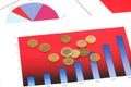 Various coins over the charts Royalty Free Stock Photo