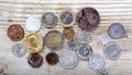 various coins on wood background