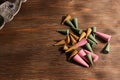 Various color and scent of cone incense on the wooden table Royalty Free Stock Photo