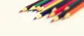 Various Color of Wooden Pencils Corner View on a Pure White Background.Sorted Colorful Pencils with Selective Focus on Subject.