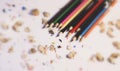 Various Color of Wooden Pencils and Shavings Top Corner View on a Pure White Background.Sorted Colorful Pencils with Selective Royalty Free Stock Photo