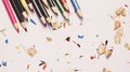 Various Color of Wooden Pencils and Shavings Top Corner View on a Pure White Background.Sorted Colorful Pencils with Selective