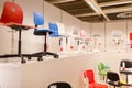 Various colored chairs on shelves