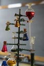 Various colored chemical solution inside flask into chemistry laboratory
