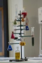 Various colored chemical solution inside flask into chemistry laboratory