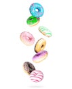 Various colored donuts in the air, isolated on a white background Royalty Free Stock Photo