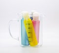 Various colored pastels in a clear beaker size 500cc for use in cosmetic items or experimental graphics.