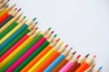 Various colored pencils on a white background. Royalty Free Stock Photo