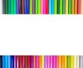 Various colored pencils on a white background line up beautifully and have a copyspace in the middle of the image. Royalty Free Stock Photo