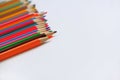 Various colored pencils on a white background. Royalty Free Stock Photo