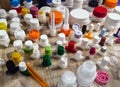 Various colored plastic caps arranged on a table showcasing Royalty Free Stock Photo