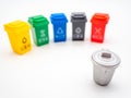 Various colored recycle bins for different type of trash versus traditional trash bin on white, recycling environment protection c Royalty Free Stock Photo