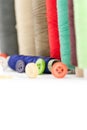 Various colored spools and buttons housework hobby tailoring concept Royalty Free Stock Photo