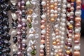 Various colorful beads in the market. Wallpaper background of a colorful necklace made of precious stones and colored beads Royalty Free Stock Photo