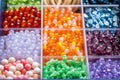 various colorful beads in a sorting box for necklace crafting Royalty Free Stock Photo