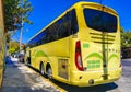 Various colorful buses tour bus transport in Puerto Escondido Mexico