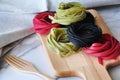 Various Colorful Healthy Pasta on Wooden Board Royalty Free Stock Photo