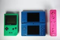 Various colorful Nintendo retro games. Portable Gameboy, DS and Wii controller. Royalty Free Stock Photo