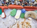 Various colorful remains polished by the sea