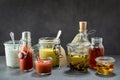 Various condiments in jars and bottles