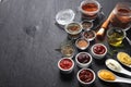 Various Condiments on Table with Copy Space Royalty Free Stock Photo