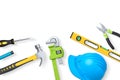 Various construction tools including wrench, hammer, pliers, and helmet isolated on white background with clipping path Royalty Free Stock Photo