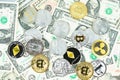 Various cryptocurrency coins on dollar banknotes. Bitcoin, ethereum, litecoin and others modern virtual currency. Digital crypto