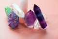 Various crystals for healing and magical practices. Faceted amethyst, rose quartz, fluorite, rock crystal, a cluster of quartz Royalty Free Stock Photo