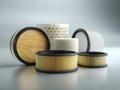 Various cylindrical air and oil filters displayed on a reflective surface showcasing different textures and materials for Royalty Free Stock Photo