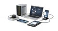 Data Processing and Wireless Communication Devices Featuring a Server Laptop and Smartphones on a White Surface for Royalty Free Stock Photo