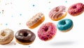 Various decorated doughnuts in motion falling on white background Royalty Free Stock Photo