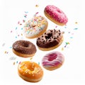 Various decorated doughnuts in motion falling on white background Royalty Free Stock Photo