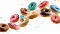 Various decorated doughnuts in motion falling on white background Royalty Free Stock Photo