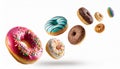 Various decorated doughnuts in motion falling on white background Royalty Free Stock Photo
