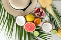 Various delicious exotic fruits with hat on light table
