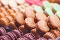 Various delicious macarons on a showcase