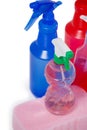 Various detergent spray bottle and sponge pad on white background Royalty Free Stock Photo