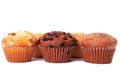 Various different muffin cup cakes white background