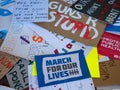 Various discarded signs for the March for Our Lives rally in in