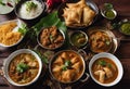 Various dishes cooked with blessing meat for Muslims in Bangkok : Samosa, Oxtail Soup, Massaman Curry with Chicken, Chicken