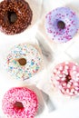 Various donuts on a colorful background. Royalty Free Stock Photo