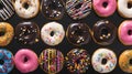 Various donuts decorated with frosting sprinkles. Bakery tasty pastry dessert, Unhealthy sugary junk food. Colored