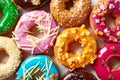 Various donuts on white background, from above Royalty Free Stock Photo