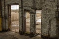 Various doorways in a brick building of an abandoned factory Royalty Free Stock Photo