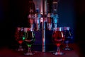 Various Drinks With Dispenser, Backlit In A Night Club