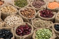 Various dry legumes in a sack cloth Royalty Free Stock Photo