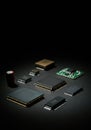 Various electronic chips and components arranged on a dark background Royalty Free Stock Photo